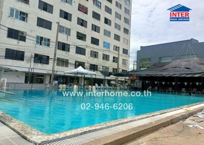 Apartment building exterior with swimming pool