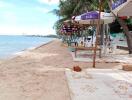 Beachfront area with chairs and umbrellas