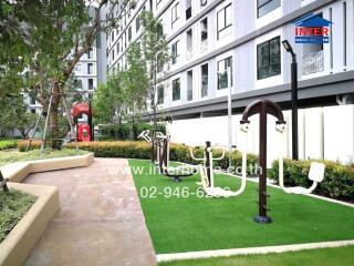 Outdoor fitness area with exercise equipment in a residential complex