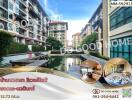 Exterior view of residential buildings with a water feature and footbridges