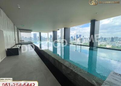 Indoor swimming pool with city view