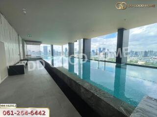 Indoor swimming pool with city view