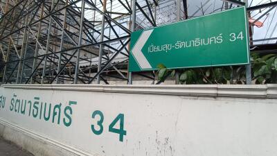 Outdoor view of building entrance with signage