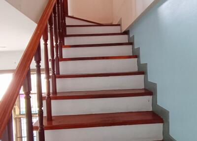 Wooden staircase with handrail