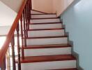 Wooden staircase with handrail