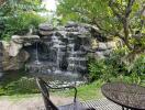 Garden with a water feature and seating area