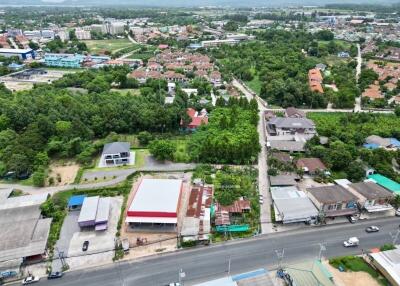 Aerial view of a residential neighborhood with greenery