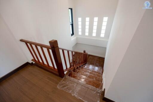 Wooden staircase with natural light