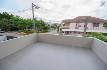 Spacious balcony with street view