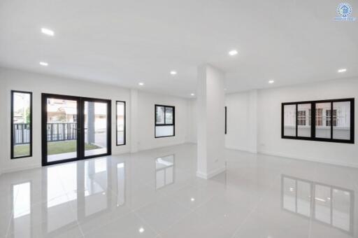 Bright and spacious main living area with large windows