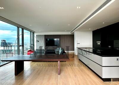 Modern living space with city view, wooden flooring, dining area, and open kitchen