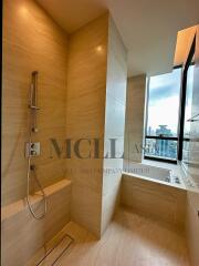 Modern bathroom with shower and city view