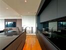 Modern kitchen with a sleek design and black cabinetry