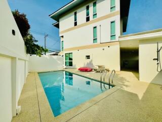 swimming pool area outside a building