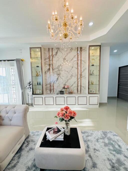 Luxurious living room with chandelier and elegant decor