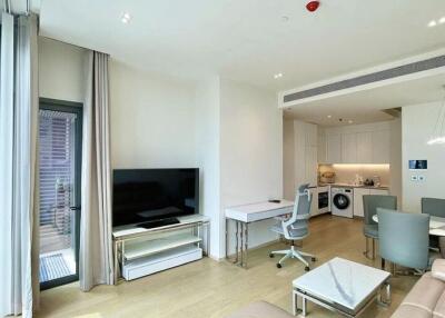 Modern living and dining area with integrated kitchen