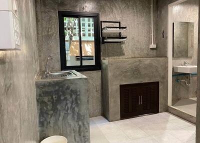 Industrial-style kitchen with concrete finishes