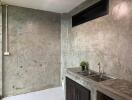 Modern kitchen with concrete walls and dual sink