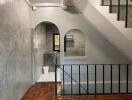 Stairwell with arched openings and modern decor