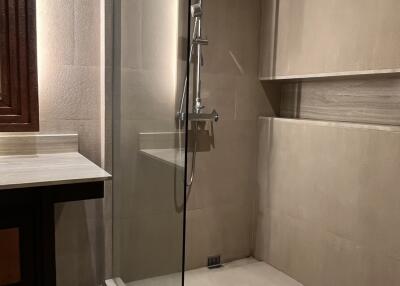 Modern bathroom with standing shower and vanity