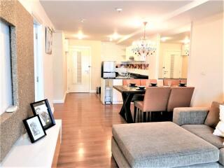 Modern living room with dining area and open kitchen