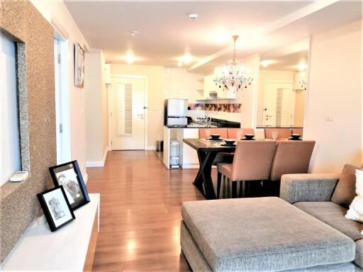 Modern living room with dining area and open kitchen