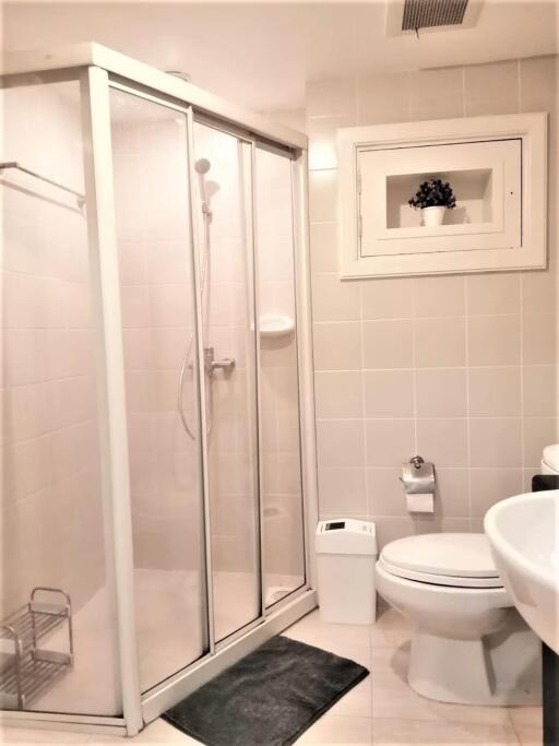 modern bathroom with shower enclosure and toilet