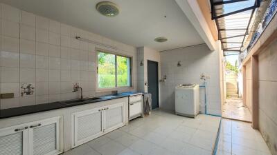 Spacious kitchen with ample counter space and natural light