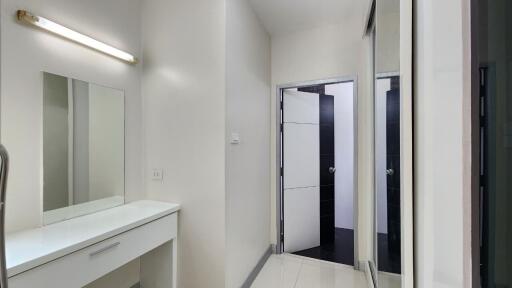 Clean bathroom with modern design and large mirror