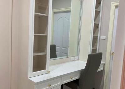 Bedroom vanity with chair and mirror
