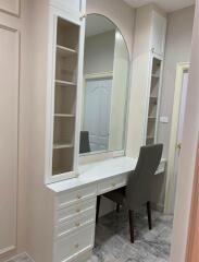 Bedroom vanity with chair and mirror