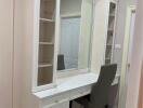 Bedroom vanity with chair and mirror