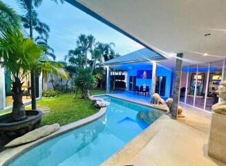 Outdoor area with swimming pool and garden