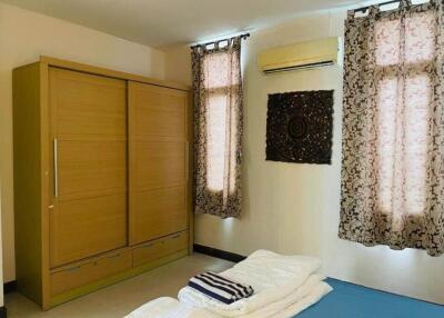 Bedroom with wardrobe and air conditioning