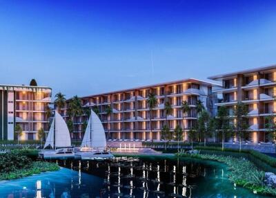 Modern residential complex with water features and sailboats