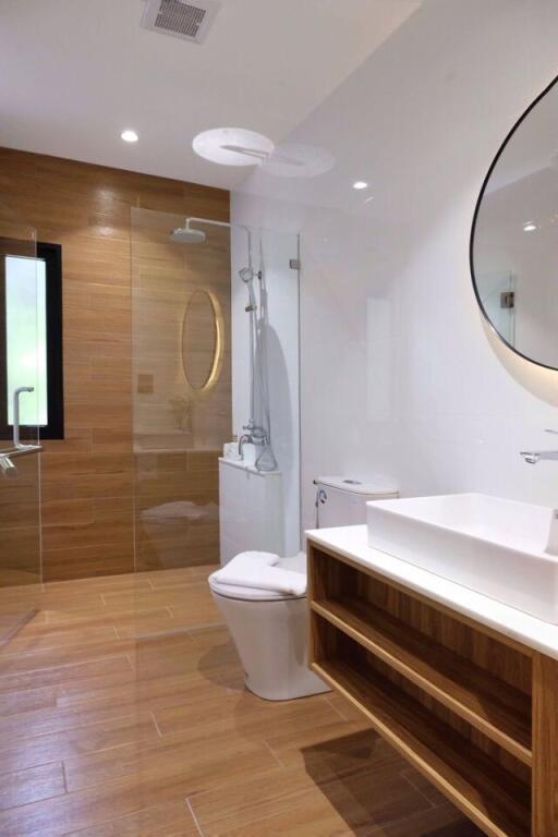 modern bathroom with wooden accents