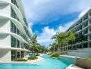 Scenic view of modern apartment buildings with a central pool