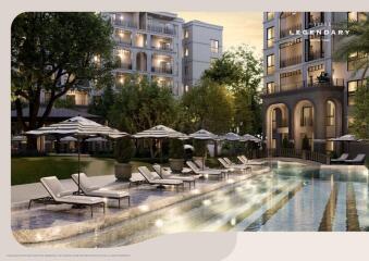 Modern luxury apartment complex with outdoor pool and loungers