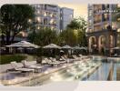 Modern luxury apartment complex with outdoor pool and loungers