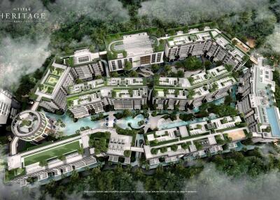 Aerial view of a residential complex with greenery and swimming pools