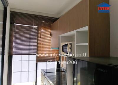 Modern kitchen with built-in cabinets and appliances