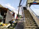 Photo of a building exterior with outdoor stairway