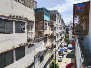 Exterior view of residential buildings in an urban neighborhood