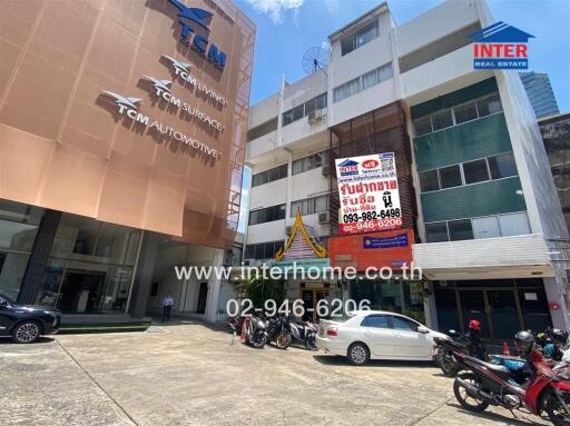 Commercial buildings with multiple levels and parking space