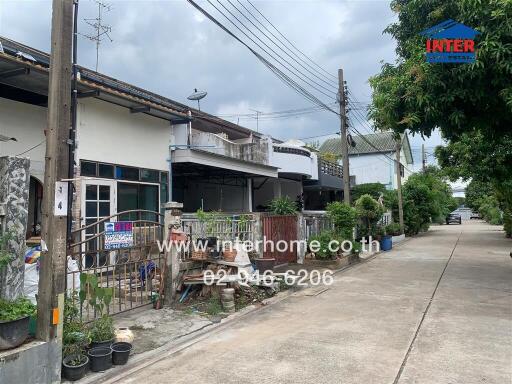 Exterior view of a residential building with a street