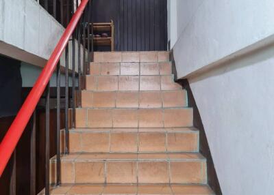 Staircase leading to an apartment door