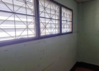 Room with barred windows