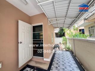 Outdoor walkway with door entrance