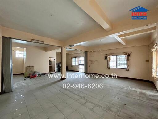 Spacious multi-purpose living area with natural light