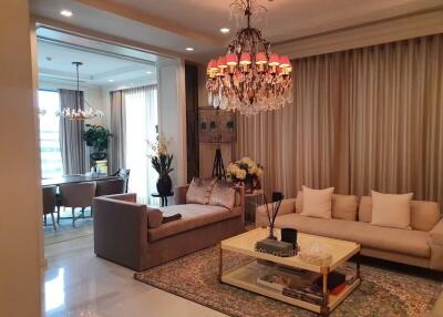 Elegant living room with adjacent dining area
